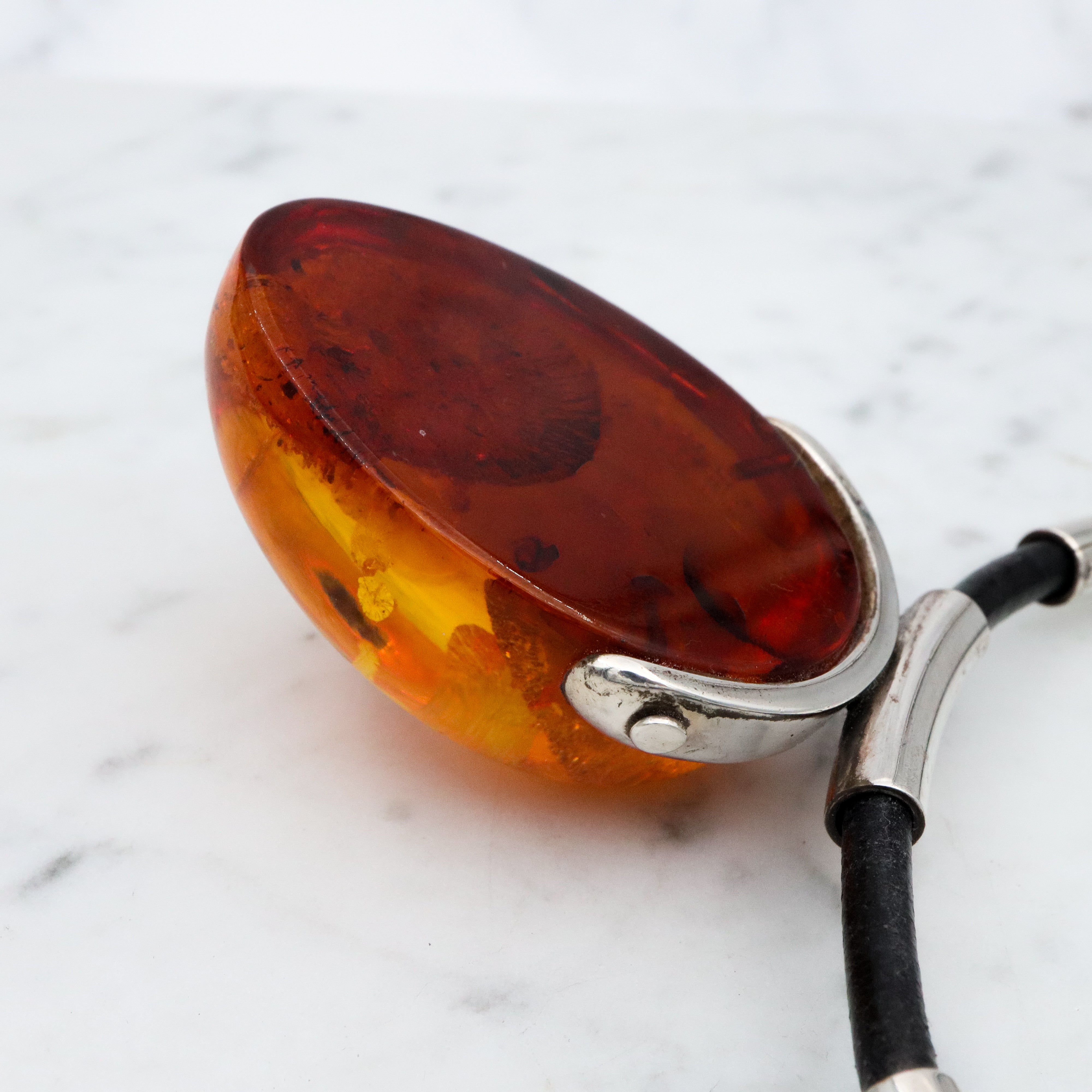 Massive retro amber sterling pendant necklace on leather cord
